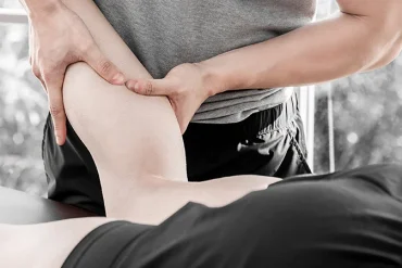 Sports massage therapy session for athletic recovery
