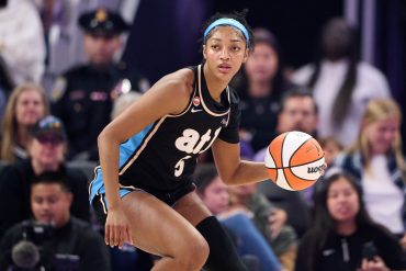 Angel Reese of the Atlanta Dream driving with the ball during the 2026 WNBA playoffs