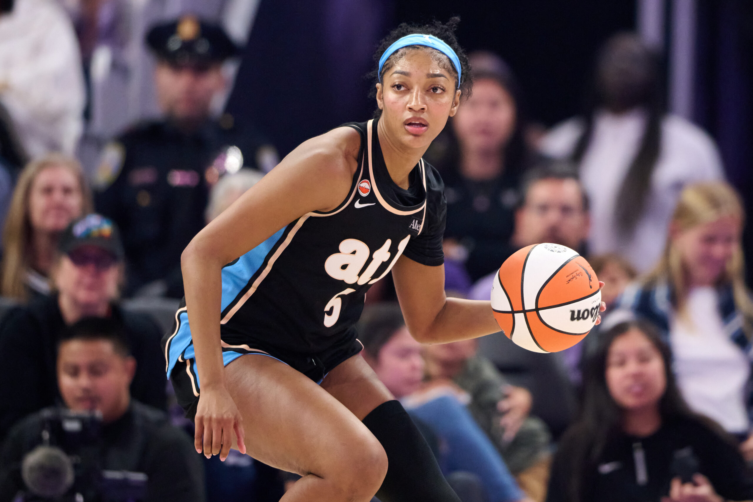Angel Reese of the Atlanta Dream driving with the ball during the 2026 WNBA playoffs