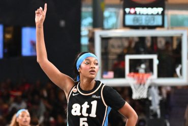Atlanta Dream forward Angel Reese dribbling during a 2026 game