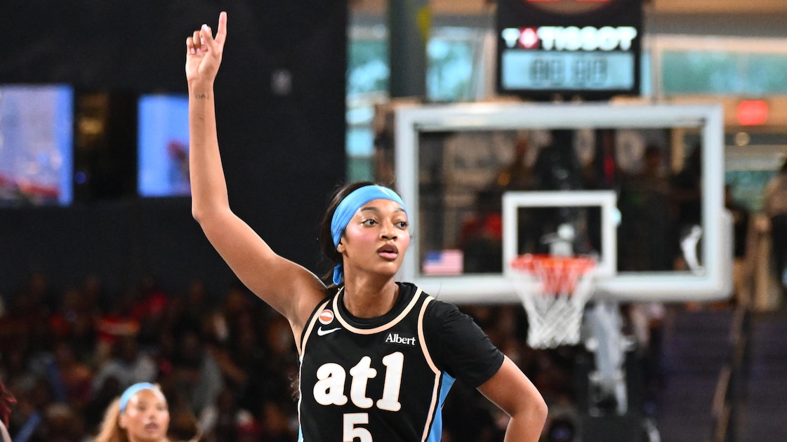 Atlanta Dream forward Angel Reese dribbling during a 2026 game